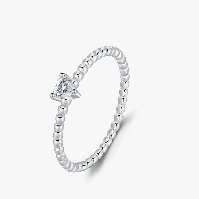 Heart Moissanite Engagement Rings with a heart-shaped moissanite gem in a sterling silver setting.