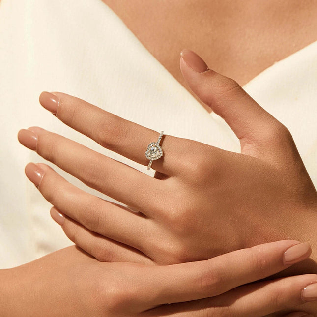 Heart Shape Moissanite Ring worn on elegant hand with soft nails, showcasing its brilliant sparkle and delicate design.