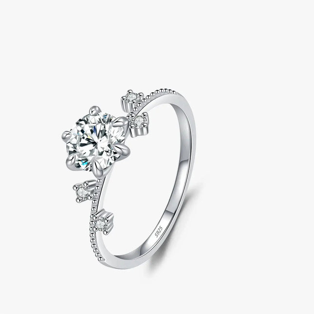 Lab Diamond Moissanite Ring 925 Sterling Silver with round gemstone and side accents on a polished band.