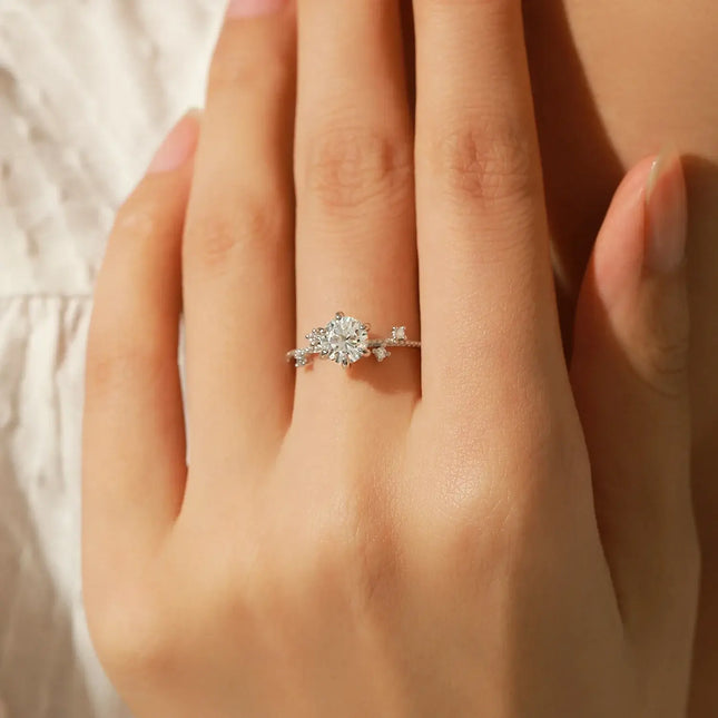 Lab Diamond Moissanite Ring 925 Sterling Silver shown on a woman's hand, featuring a round moissanite in a prong setting.