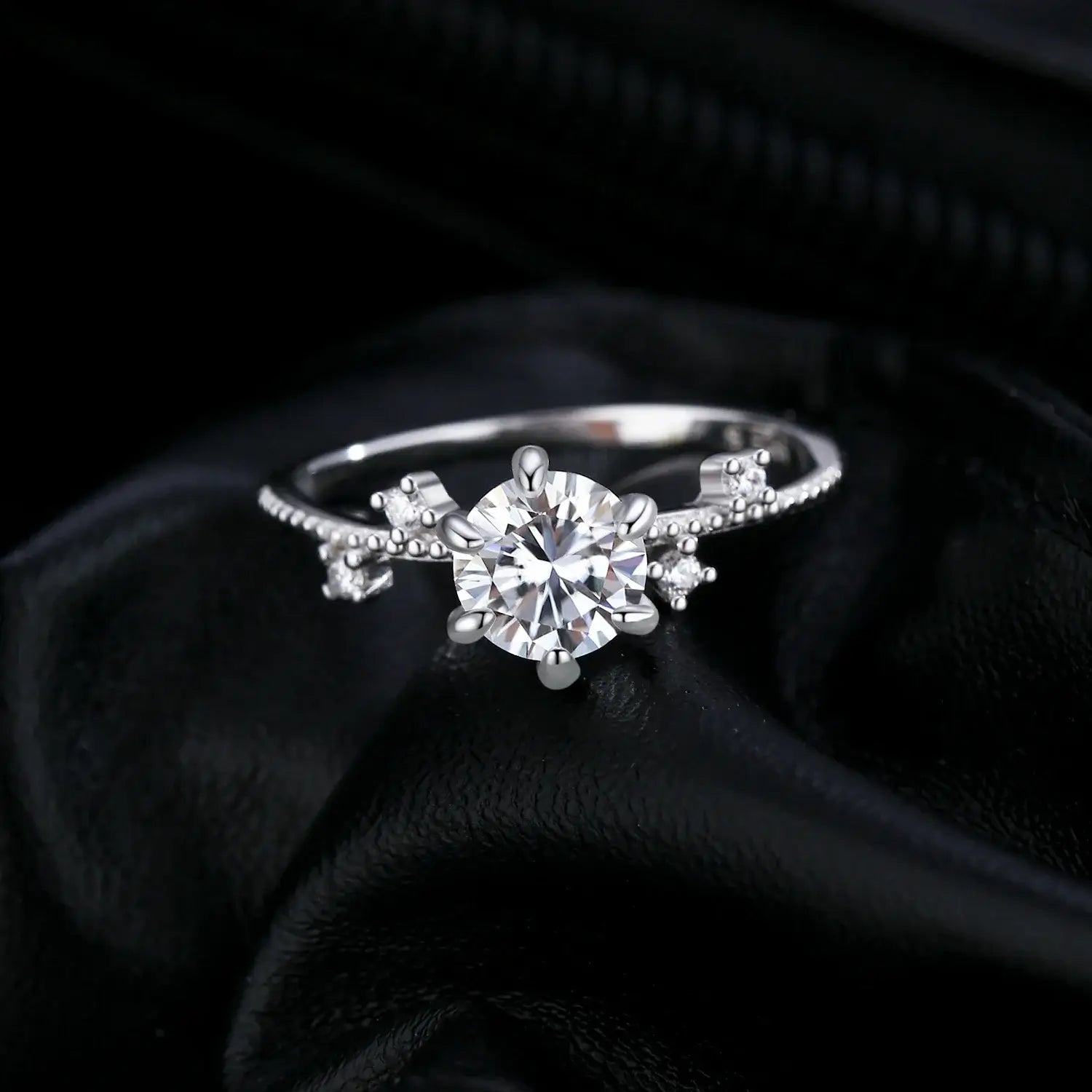 Lab Diamond Moissanite Ring 925 Sterling Silver with round moissanite in classic prong setting on black background.