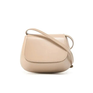Shoulder bag leather in beige - Versatile, stylish saddle bag for casual outings and elegant evenings.