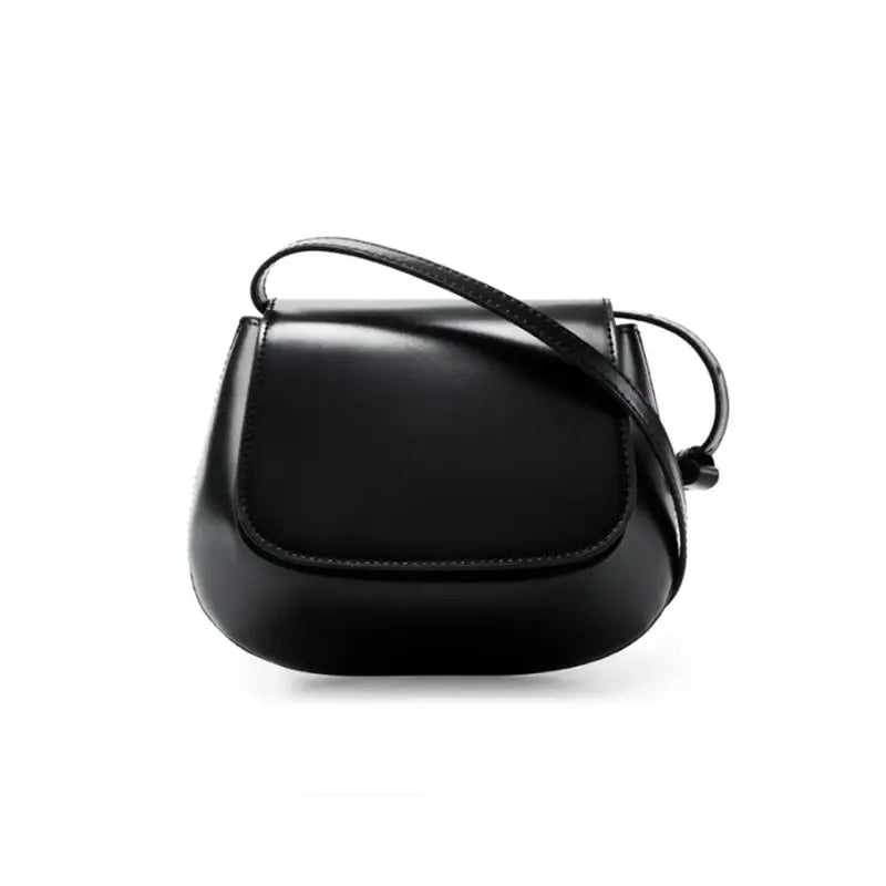 Shoulder Bag, Black Leather - Versatile women’s saddle bag with sleek cover closure and cell phone pocket.