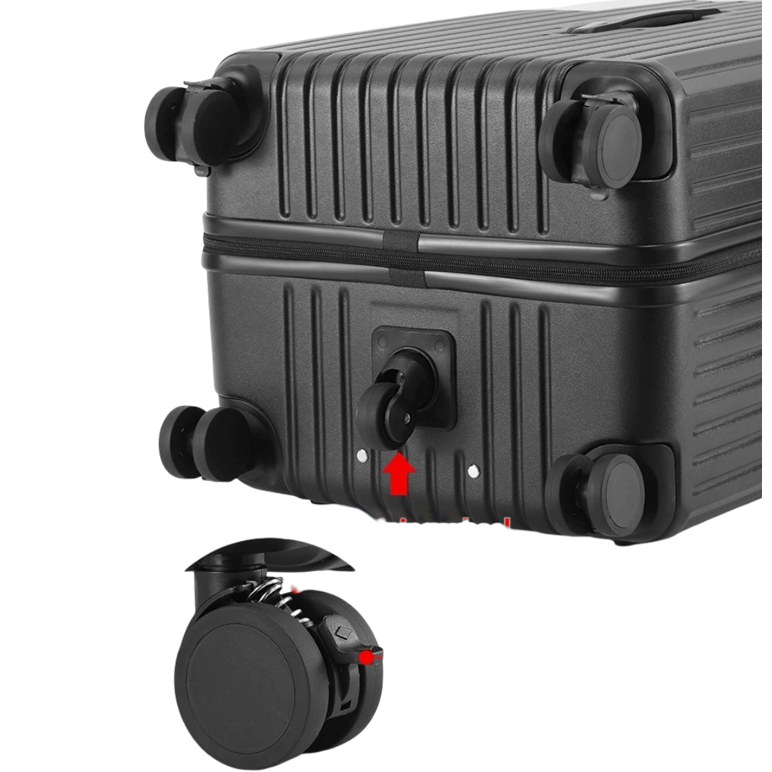 Close-up of black PC hard-shell roller luggage showing USB charging port and 360° spinner wheels for easy mobility.