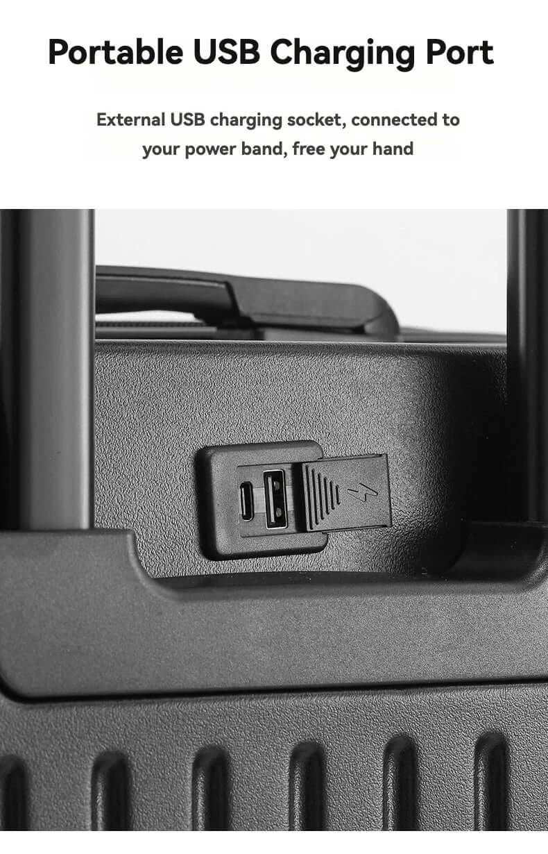 Portable USB charging port on black luggage suitcase for convenient charging while traveling.