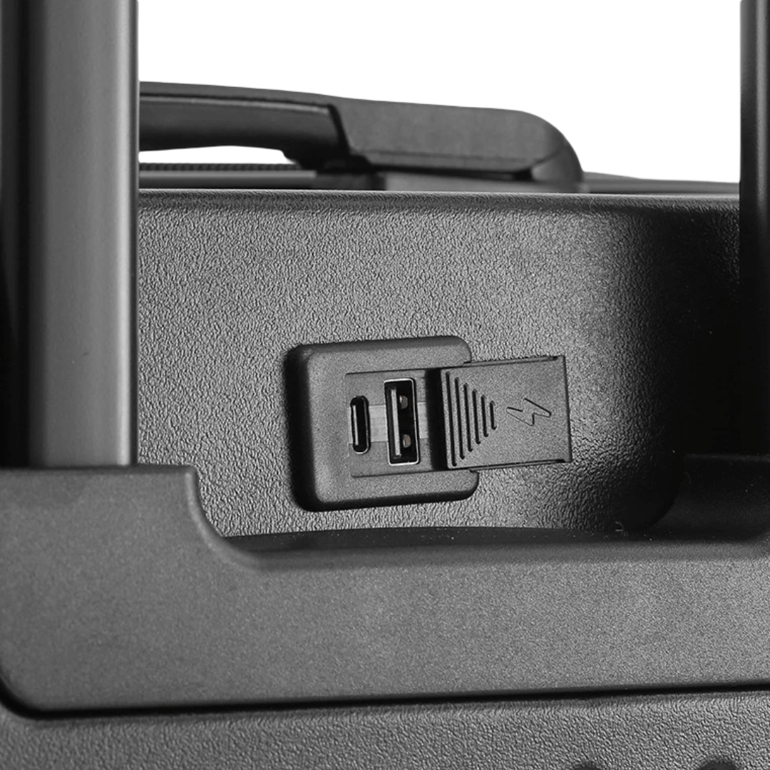 USB charging port on a durable luggage suitcase for convenient on-the-go device charging.