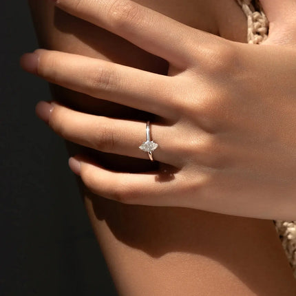 Marquise-cut Rhombic Moissanite Ring showcased on a woman's hand, featuring a geometric-cut design in 925 sterling silver.