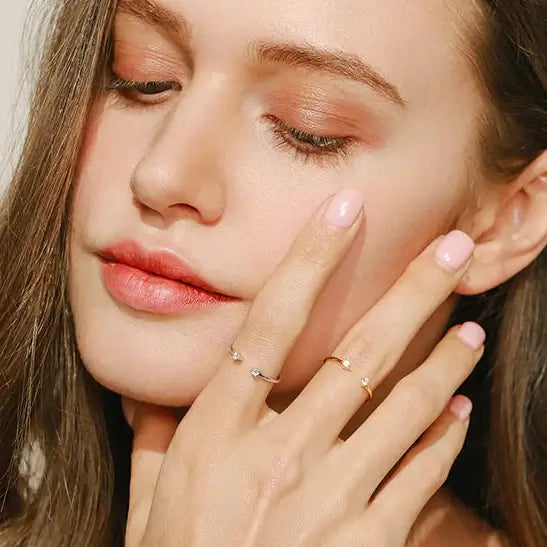 Moissanite Adjustable Ring in 925 Sterling Silver worn on a model's fingers, showcasing elegance and simplicity.