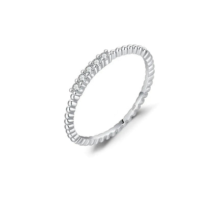 Moissanite Eternity Band Ring in 925 Sterling Silver featuring D-color VVS1 stones in refined prong setting.