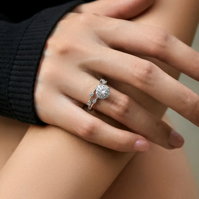 Moissanite Halo Ring with Lab Diamond Accent worn on hand, showcasing its brilliant sparkle and elegant design.