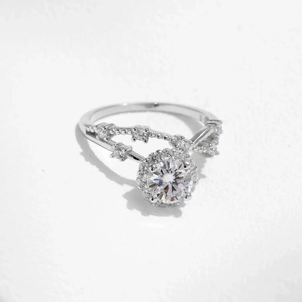 Moissanite Halo Ring with Lab Diamond Accent featuring a round-cut moissanite in an elegant crown setting.