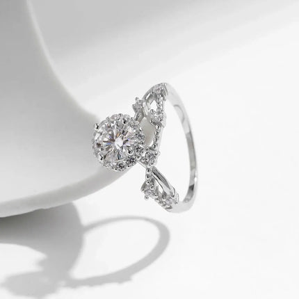 Moissanite Halo Ring with Lab Diamond Accent featuring a round-cut center stone and elegant crown design.