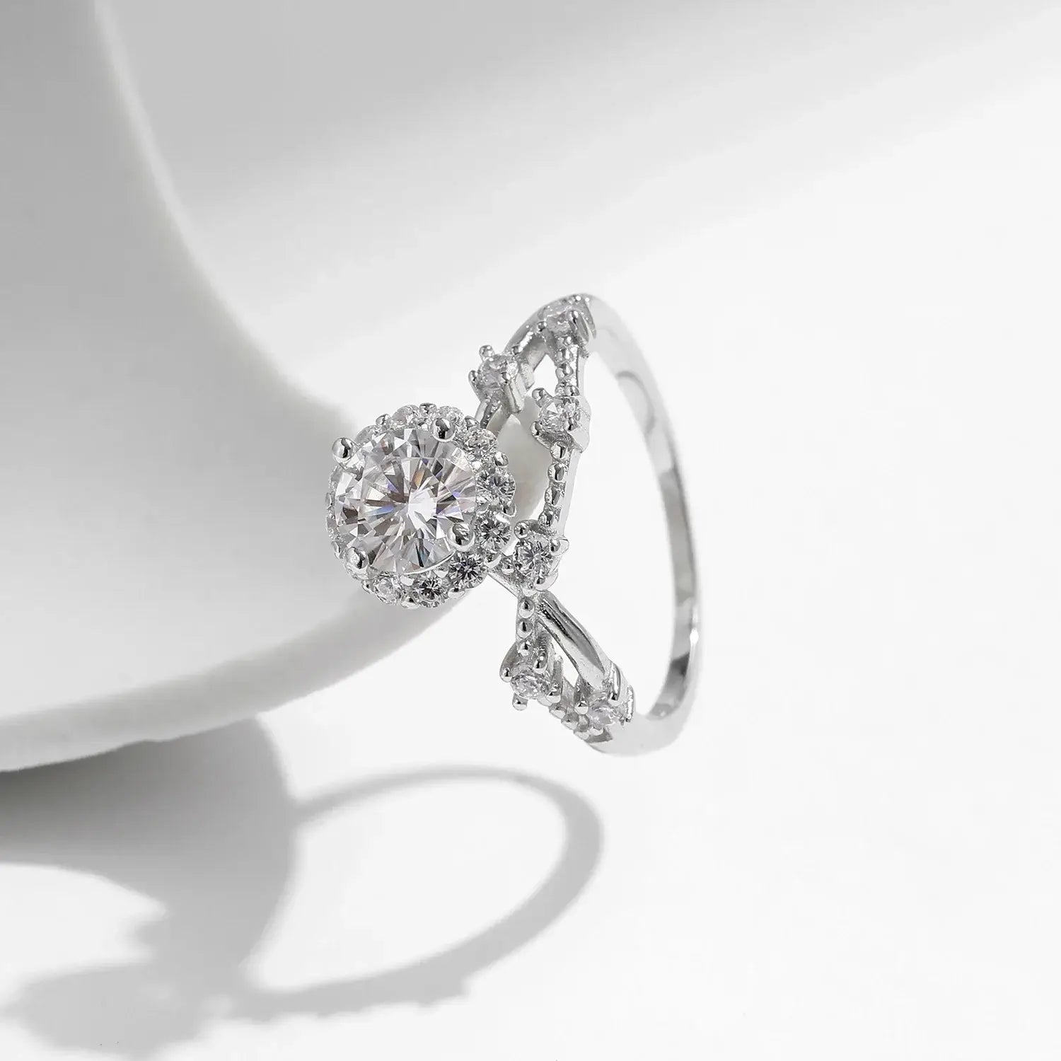 Moissanite Halo Ring with Lab Diamond Accent featuring a round-cut center stone and elegant crown design.