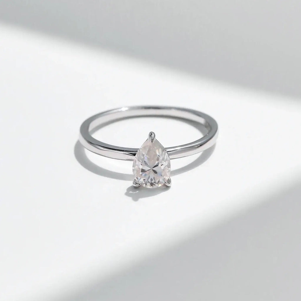Pear Cut Moissanite Ring 925 Sterling Silver with a water-drop moissanite in prong setting.
