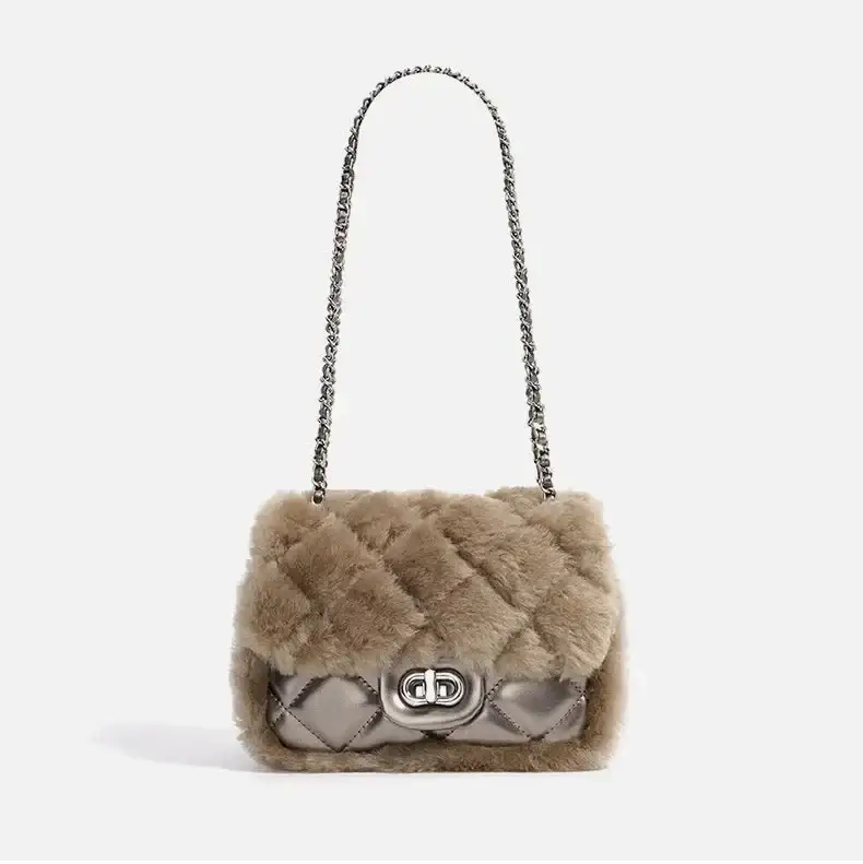 Tan faux fur handbag with chain strap and quilted design, perfect for stylish and elegant wear.
