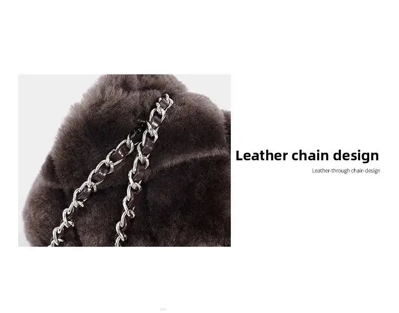 Elegant geometric leather handbag with soft box shape and chain design, perfect for women's daily use.