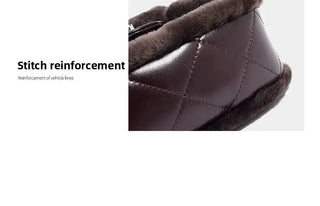 Stitch reinforcement detail of brown quilted footwear, showcasing product quality and durability.