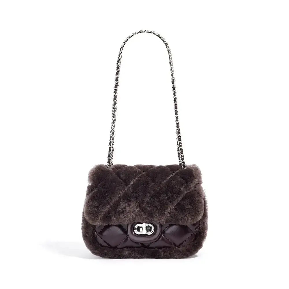 Elegant brown fur handbag with chain strap, perfect for a stylish crossbody look for women.