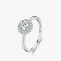 Round Moissanite Ring in 925 Sterling Silver showcasing a round-cut D-color VVS1 moissanite surrounded by cubic zirconia.