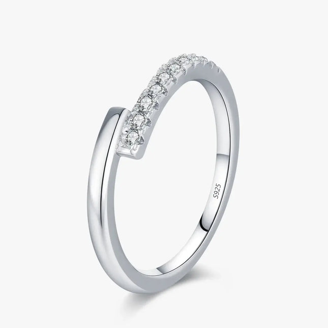 Round Pavé Moissanite Ring in 925 sterling silver with sparkly pavé setting featuring multiple D-color VVS1 stones.