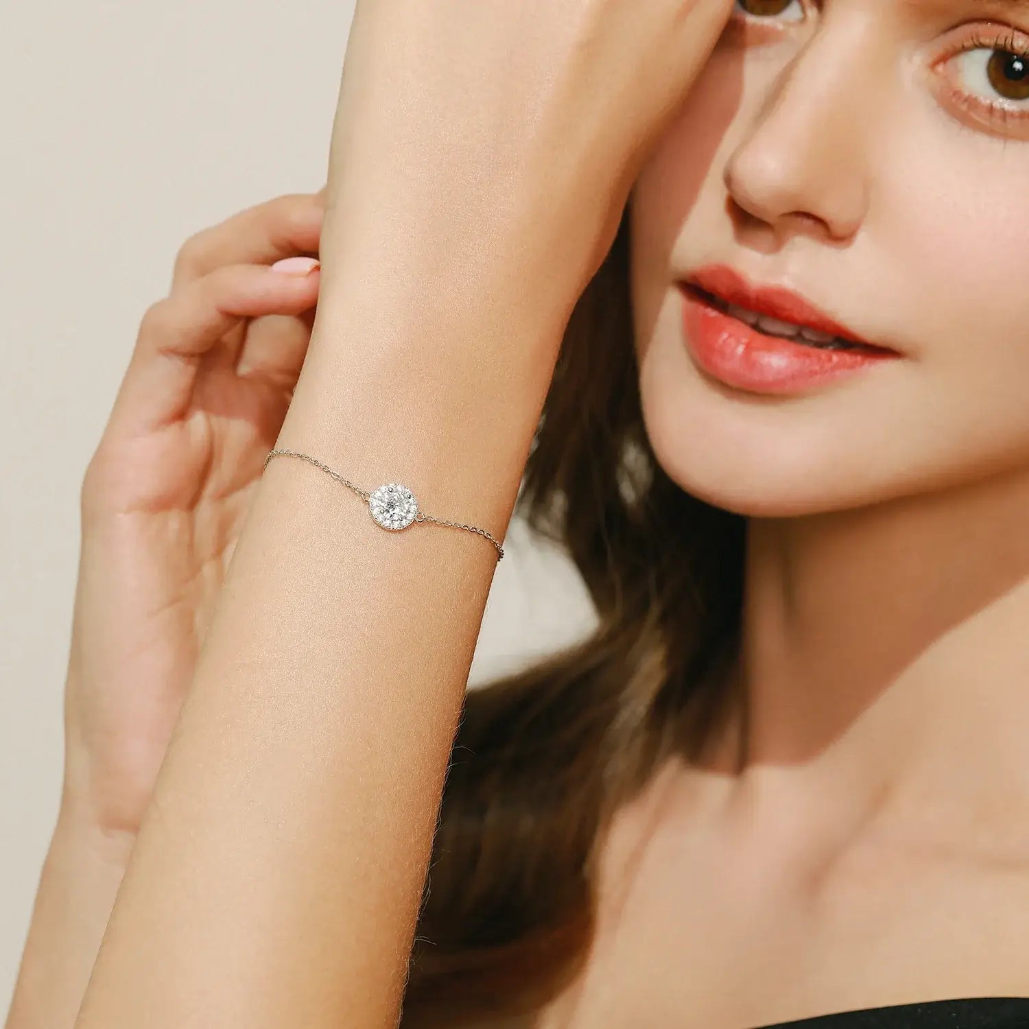 Model showcasing a Round Zircon Charm Bracelet 925 Sterling Silver with sparkling zircon stone.
