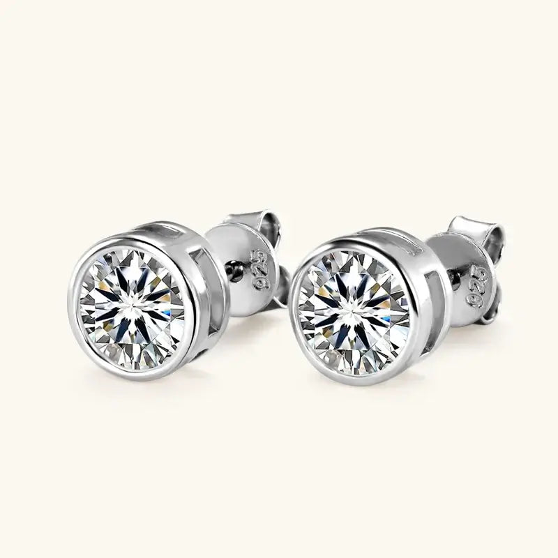 Round Moissanite Stud Earrings with push-back findings featuring GIC certification for quality assurance.