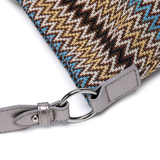 Women's shoulder bag multicolor zigzag pattern in brown and blue with silver hardware detail close-up.