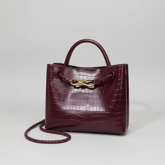 Women's Handbag Stone Pattern Tote Bag in burgundy with bow detail and shoulder strap.