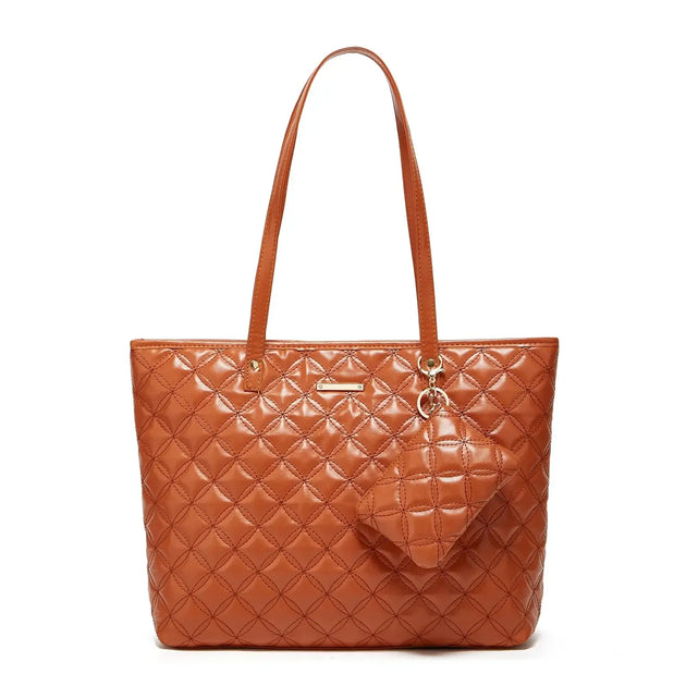 Tote Bag soft and versatile two-piece set in quilted orange synthetic leather for stylish daily use.