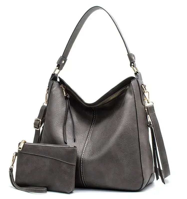 Hobo shoulder bag with matching wallet pouch, made from high-quality PU leather in gray.