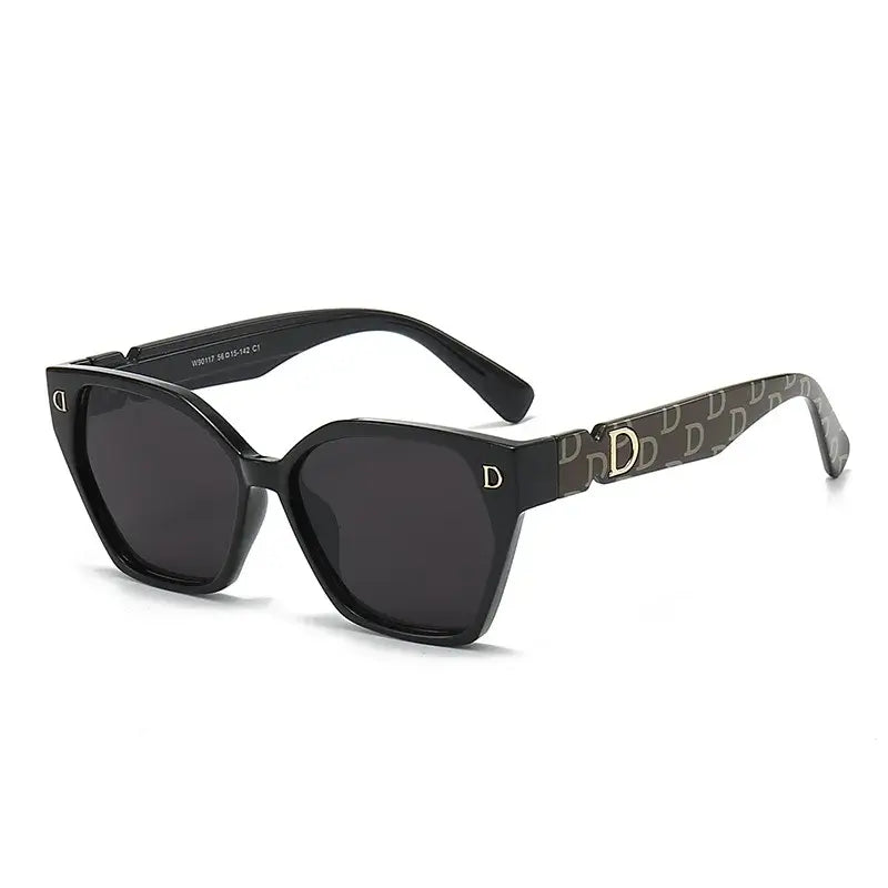 Stylish women's sunglasses for men with black frames and trendy detailing, perfect for a fashionable look.