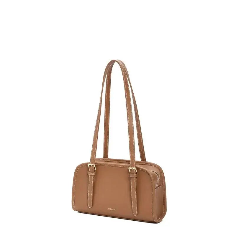Classic Shoulder Bag in tan color with two straps and solid pillow shape, designed for women.