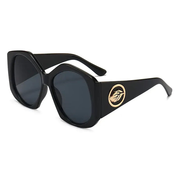 Stylish sunglasses with a unique design and logo, perfect for outdoor sports and summer activities.