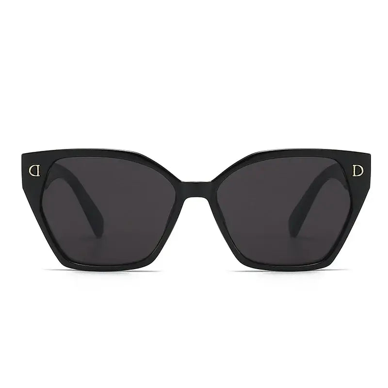 Trendy women's sunglasses with black frames and dark lenses, perfect for stylish summer looks.
