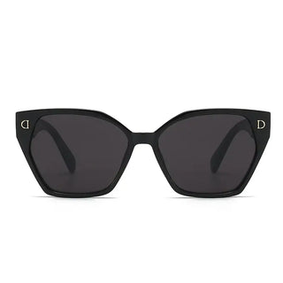 Trendy women's sunglasses with black frames and dark lenses, perfect for stylish summer looks.
