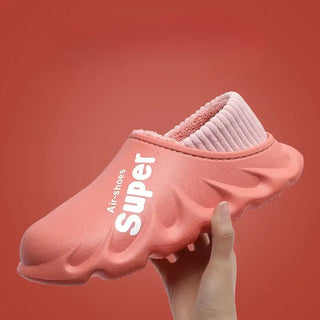 Winter Slippers Warm Unisex Shoes Waterproof in pink, featuring a soft cozy interior and pull-on design.