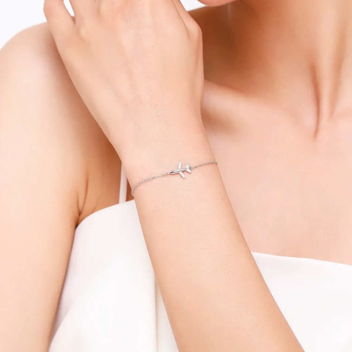 Elegant Bracelet 925 Sterling Silver worn on a wrist with a geometric design featuring zircon and crystal stones.