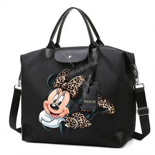 Disney Mickey Mouse Crossbody Bag featuring a graphic of Mickey with a leopard print bow.