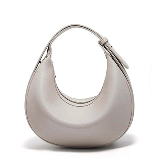Half Moon Bag with Minimalist Design in soft grey finish and single strap, perfect for casual outings.