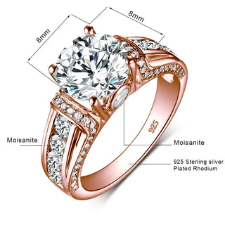 Ring Moissanite Diamond showcasing a large center stone with intricate design, set in 925 sterling silver plated rhodium.