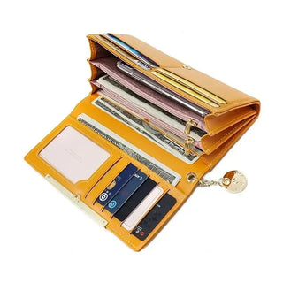 Wallet leather for women in yellow with multiple card slots, cash compartment, and zipper closure.