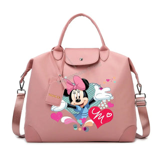 Disney Mickey Mouse Crossbody Bag featuring Minnie Mouse design on a pink background.