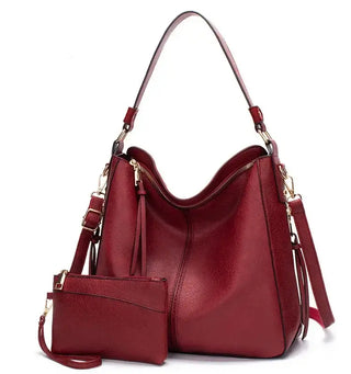 Hobo shoulder bag with wallet pouch in stylish red PU leather, featuring gold-tone hardware and spacious design.