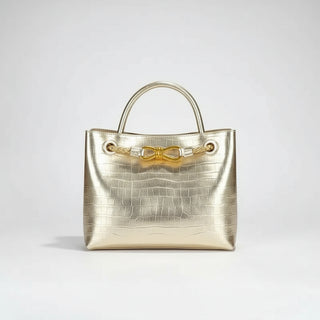 Stylish Women's Handbag in metallic gold with crocodile pattern and elegant gold accents.