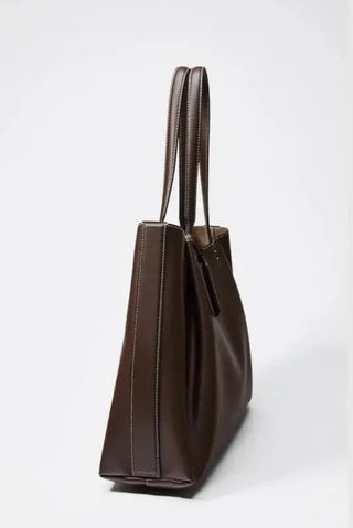Tote Bag Classic in brown color with stylish design and dual shoulder straps, featuring a sleek zipper pocket.