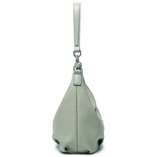 Light green luxury crossbody bag for women, soft PU material, casual satchel with wide strap, suitable for parties.