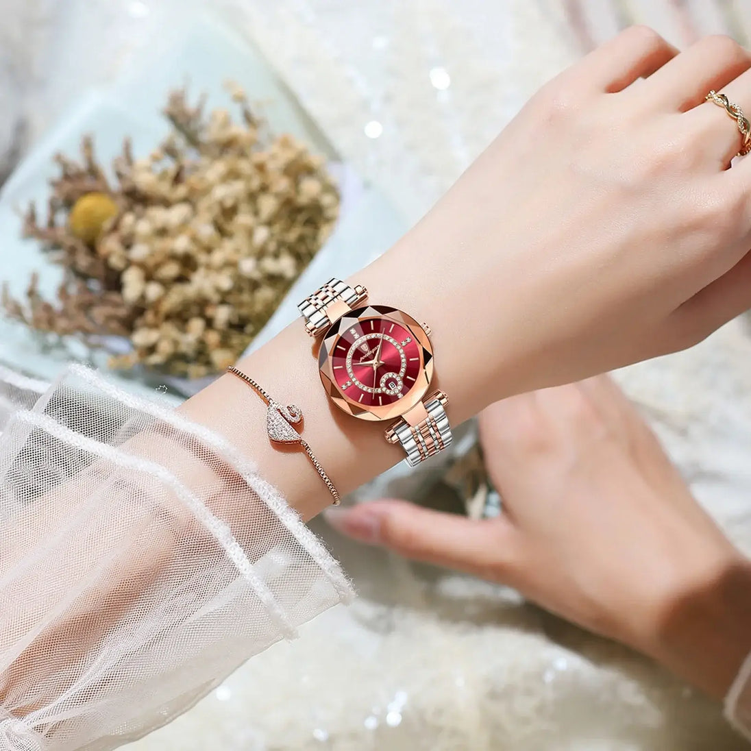 Wristwatch For Woman with diamond and rose gold band, displayed elegantly on a woman's wrist.