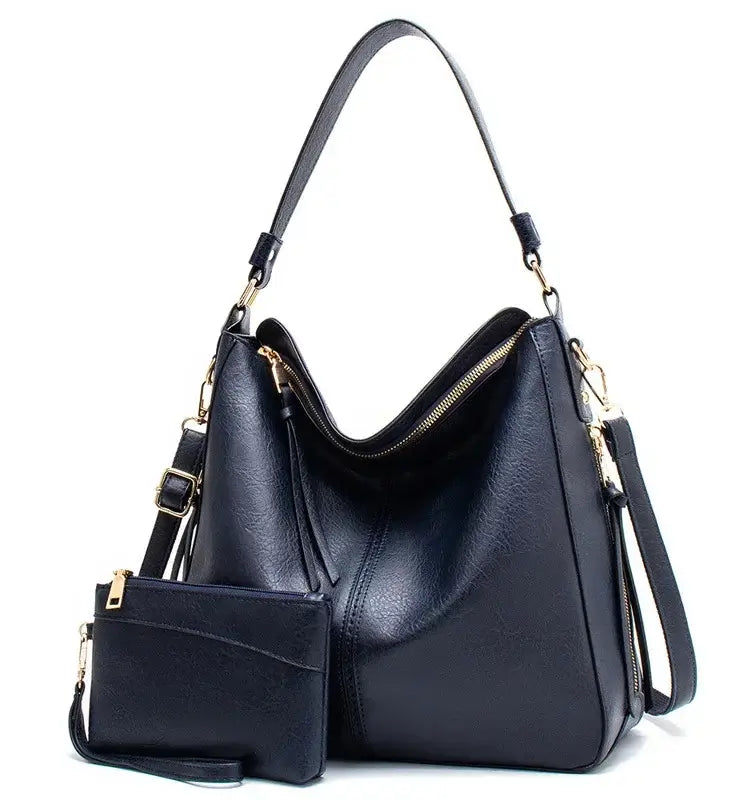Hobo shoulder bag with matching wallet pouch, crafted from high-quality PU leather, featuring gold-tone hardware.