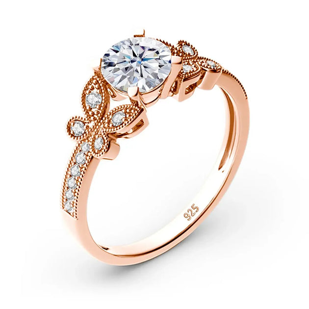 Moissanite Butterfly Rings For Women featuring a beautiful rose gold design with a large central stone.