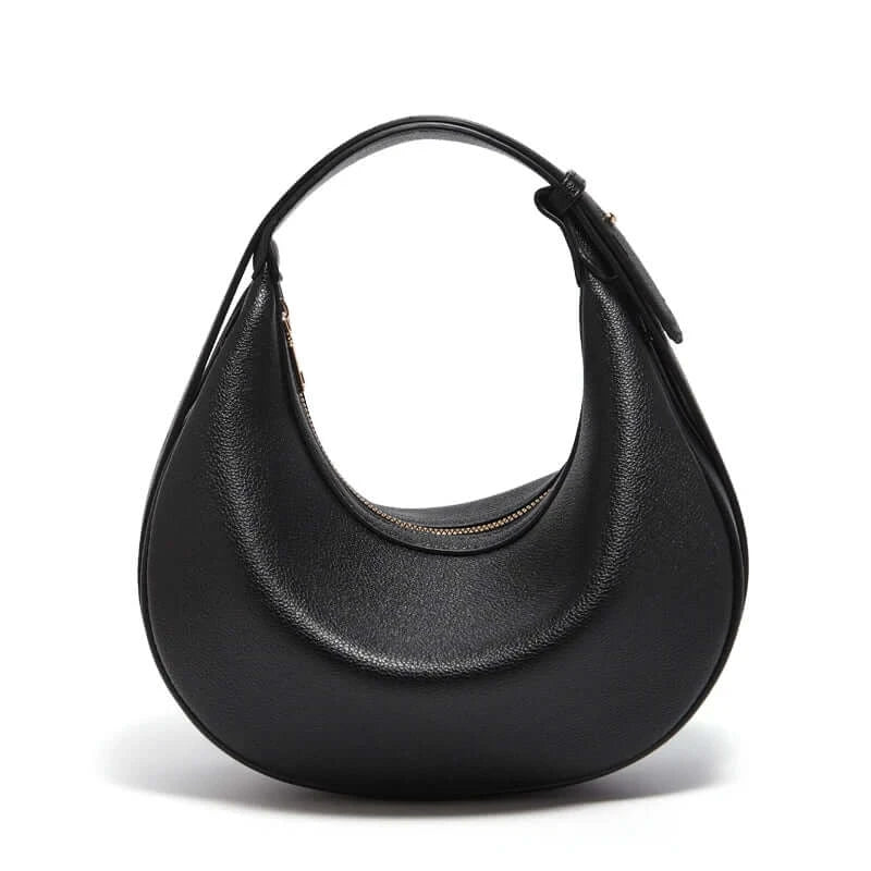 Half Moon Bag with Minimalist Design in black, featuring a sleek curved silhouette and zipper closure.